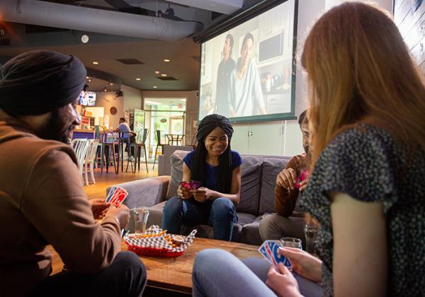 Group of people playing a game at a table